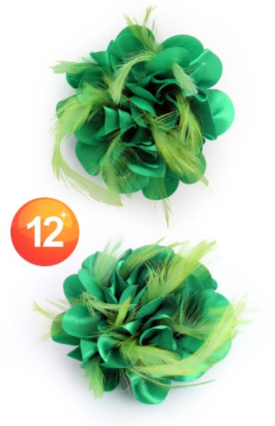 Flower on pin with green feathers